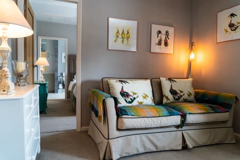 Junior Suite | 1 bedroom, blackout drapes, iron/ironing board, free WiFi