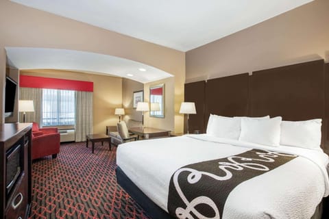 Deluxe Suite, 1 King Bed, Non Smoking | Premium bedding, desk, blackout drapes, iron/ironing board