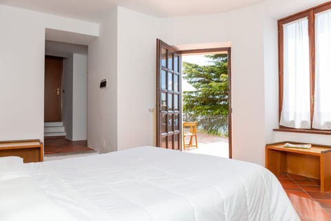 Standard Double Room, 1 Double Bed, Garden View, Garden Area | Frette Italian sheets, premium bedding, down comforters, minibar