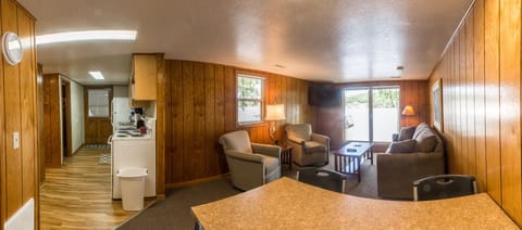 Deluxe Cabin, 2 Bedrooms, Lake View | Living area | Flat-screen TV, foosball