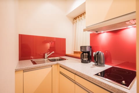 Studio, Balcony, Garden View | Private kitchen | Full-size fridge, stovetop, toaster, cookware/dishes/utensils