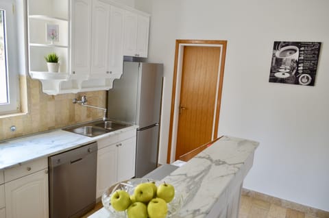 Apartment, 2 Bedrooms, Sea View | Private kitchen | Full-size fridge, microwave, oven, stovetop