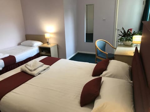 Family Triple Room, Multiple Beds, Garden View | Desk, iron/ironing board, free WiFi, bed sheets