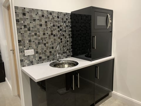 Fridge, microwave, electric kettle, toaster