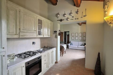 Apartment, 1 Bedroom, Garden View (Olivo) | Private kitchen | Full-size fridge, oven, stovetop, coffee/tea maker