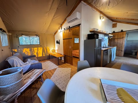 Luxury Bungalow, 2 Bedrooms, Mobility Accessible | Living area | Flat-screen TV