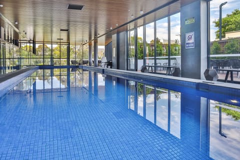 Indoor pool, open 6:00 AM to 9:00 PM, sun loungers