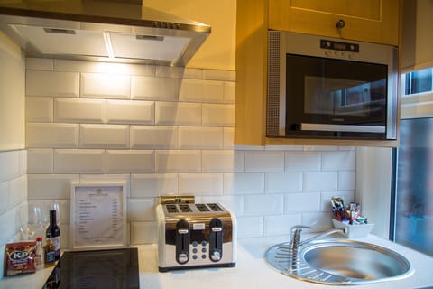 Apartment, 1 Bedroom (The Library) | Private kitchenette | Mini-fridge, microwave, electric kettle, toaster