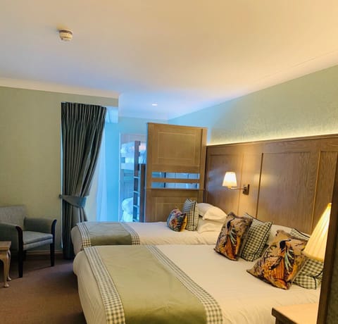 Family Quadruple Room | Premium bedding, in-room safe, individually decorated