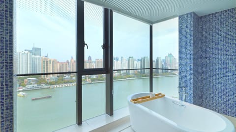 Premium Room, 1 King Bed, River View | Bathroom | Designer toiletries, hair dryer, bathrobes, slippers