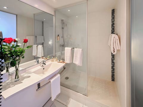 Shower, eco-friendly toiletries, hair dryer, towels