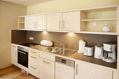 Apartment, 2 Bedrooms | Private kitchen | Fridge, stovetop, coffee/tea maker, electric kettle