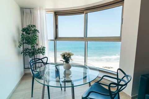 Panoramic Suite, 2 Bedrooms, Beach View | Living area | TV