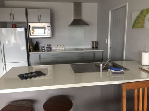 Apartment, 2 Bedrooms, Ground Floor | Private kitchenette | Fridge, microwave, stovetop, dishwasher