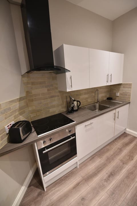 Classic Apartment, 1 King Bed with Sofa bed, Accessible, Garden View | Private kitchen | Full-size fridge, microwave, oven, stovetop