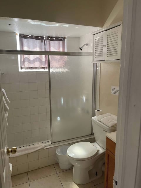 Studio, 1 Queen Bed, Partial Sea View | Bathroom | Shower, rainfall showerhead, free toiletries, towels