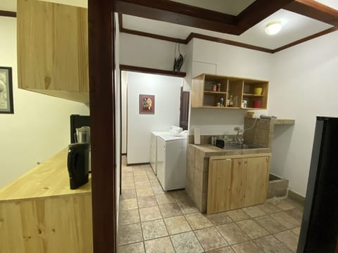 Economy Apartment, Multiple Beds, Non Smoking | Private kitchen | Full-size fridge, microwave, oven, stovetop