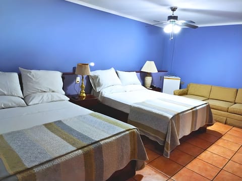 Family Room, Multiple Beds, Non Smoking | In-room safe, iron/ironing board, free WiFi, bed sheets