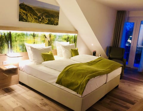 Deluxe Double Room, Garden View | In-room safe, desk, blackout drapes, rollaway beds