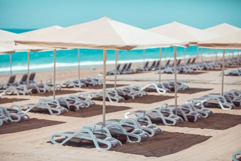 Private beach, beach cabanas, sun loungers, beach umbrellas