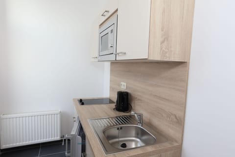 Apartment, 1 Bedroom | Private kitchenette | Fridge, microwave, stovetop, electric kettle