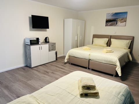 Family Room | Blackout drapes, soundproofing, free WiFi, bed sheets