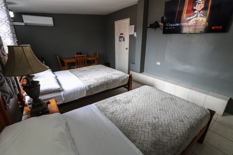 Comfort Triple Room, Multiple Beds, Refrigerator | Desk, iron/ironing board, free WiFi, bed sheets