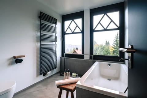 Design Double Room | Bathroom | Hair dryer, towels, soap, shampoo