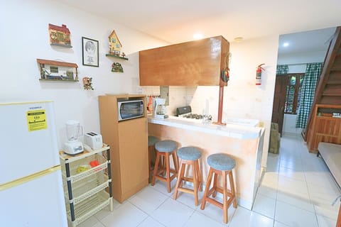 Family Apartment, Multiple Beds, Non Smoking (Floral) | Private kitchen | Fridge, microwave, stovetop, coffee/tea maker