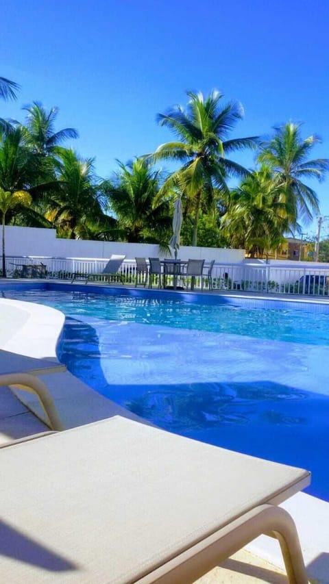 2 outdoor pools, pool umbrellas, sun loungers