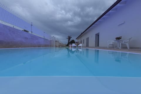 Seasonal outdoor pool, open 10:00 AM to 9:00 PM, sun loungers