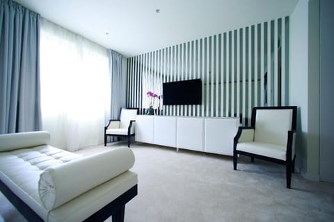 Luxury King Room | Living area | LCD TV