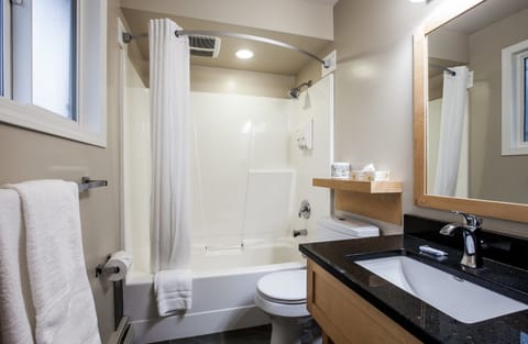 Room, 2 Queen Beds, Non Smoking | Bathroom | Combined shower/tub, hair dryer, towels