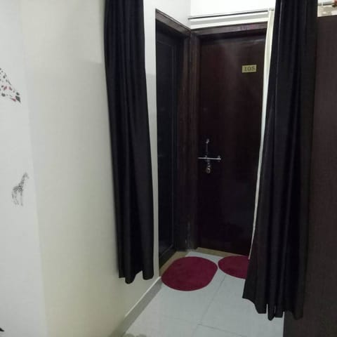 Deluxe Room, Private Bathroom | Living area | TV