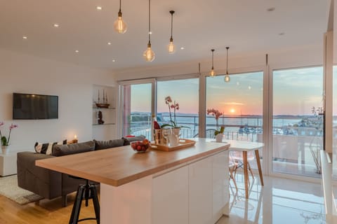 Panoramic Apartment, 2 Bedrooms, Sea View | Living area | 42-inch flat-screen TV with cable channels, TV