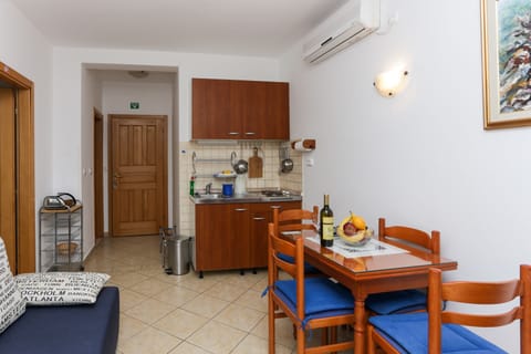 Apartment, 1 Bedroom, Balcony, Sea View | Private kitchenette | Fridge, electric kettle, cookware/dishes/utensils