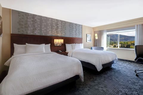 Premium bedding, down comforters, pillowtop beds, individually decorated