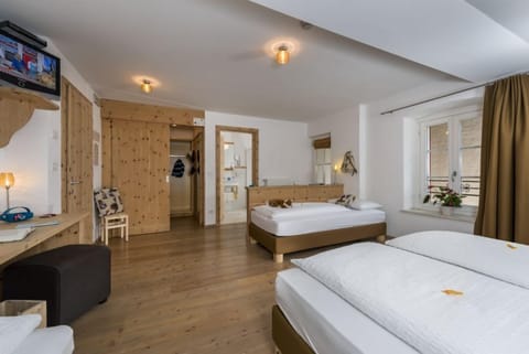 Superior Quadruple Room, 1 Bedroom | Down comforters, pillowtop beds, minibar, in-room safe