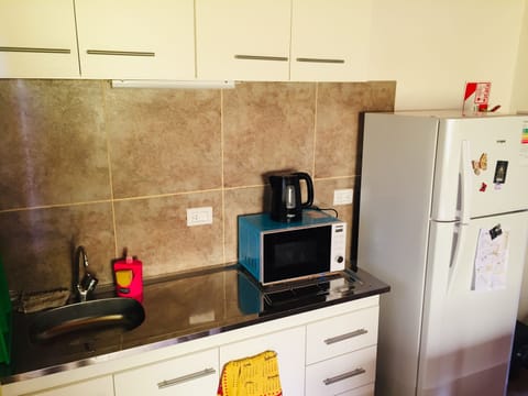 Family Room, 1 Bedroom, Non Smoking | Private kitchen | Full-size fridge, microwave, stovetop, electric kettle