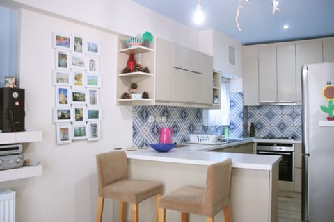 Superior Apartment, 2 Bedrooms, Sea View | Private kitchen | Full-size fridge, coffee/tea maker, electric kettle, toaster