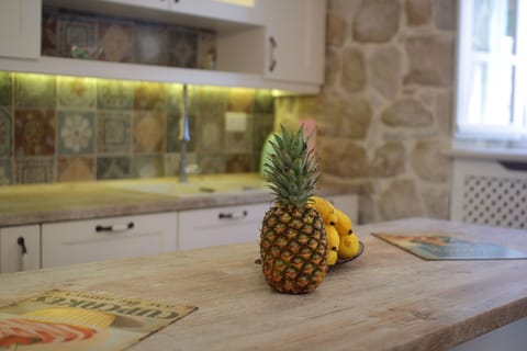 Villa | Private kitchen | Fridge, microwave, oven, stovetop