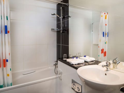 Shower, eco-friendly toiletries, hair dryer, towels