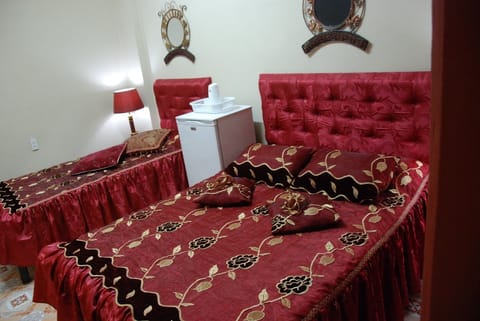 Standard Room, 1 Queen Bed, Smoking | In-room safe, blackout drapes, soundproofing, free WiFi