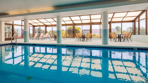 Indoor pool, open 7:00 AM to 9:00 PM, sun loungers