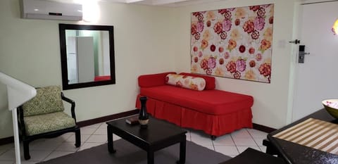 Apartment, 1 King Bed, Non Smoking | Iron/ironing board, free WiFi, bed sheets