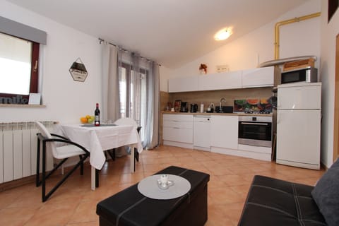 Apartment, 1 Bedroom, Sea View | Private kitchen | Fridge, microwave, stovetop, coffee/tea maker