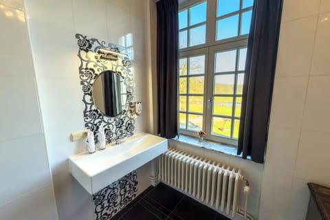 Separate tub and shower, deep soaking tub, designer toiletries