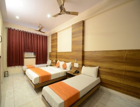 Family Room, Multiple Beds, Non Smoking | In-room safe, soundproofing, free WiFi, bed sheets