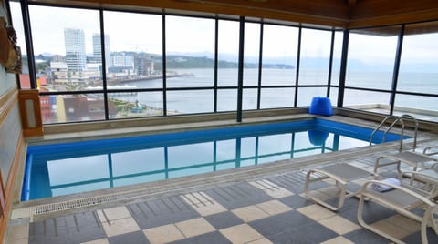 Indoor pool, open 10:00 AM to 8:00 PM, sun loungers