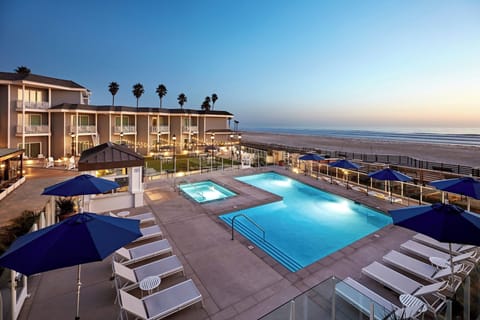 Outdoor pool, pool umbrellas, sun loungers